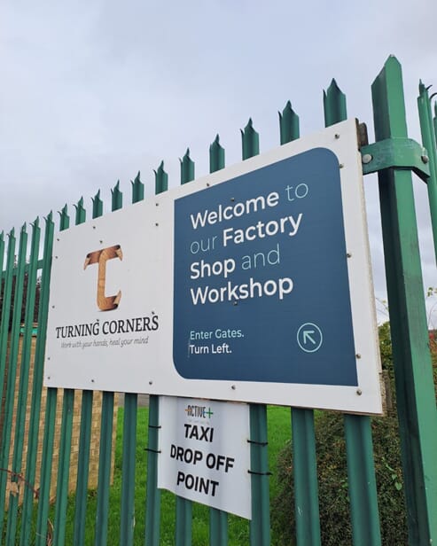 An image of the Turning Corners gate signage.